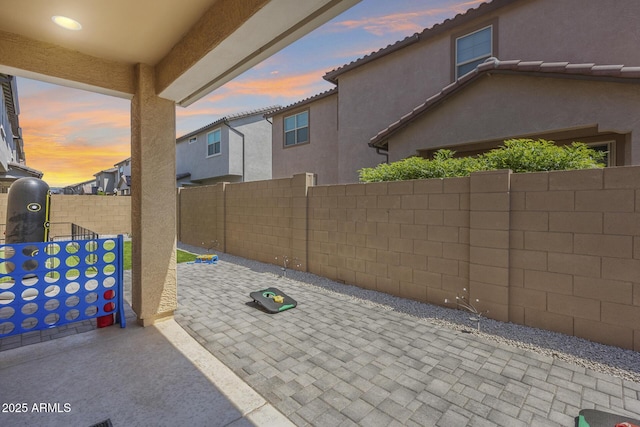 patio terrace at dusk with fence