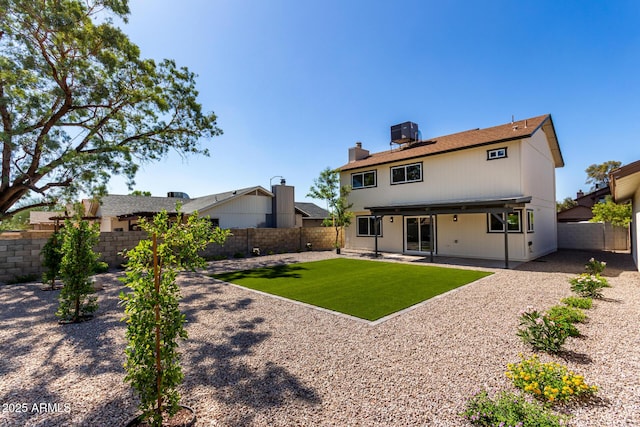 1521 W Jacinto Ave, Mesa, AZ 85202 - back of house with a fenced backyard, a patio, and a chimney