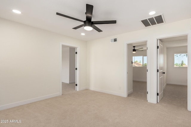 1521 W Jacinto Ave, Mesa, AZ 85202 - unfurnished bedroom with recessed lighting, light carpet, a walk in closet, and ceiling fan