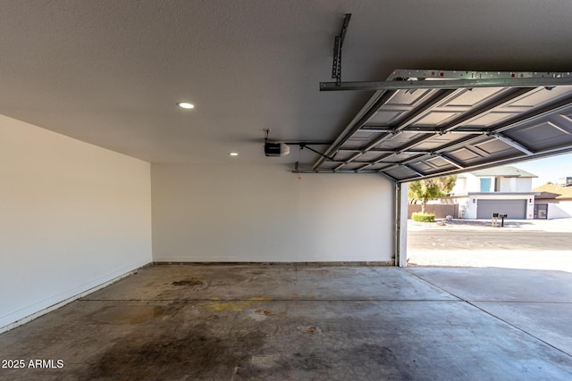 1521 W Jacinto Ave, Mesa, AZ 85202 - garage featuring a garage door opener and recessed lighting