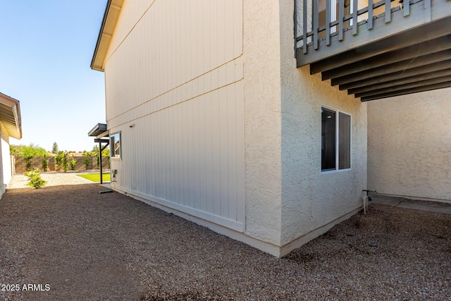 1521 W Jacinto Ave, Mesa, AZ 85202 - view of property exterior with stucco siding and a balcony