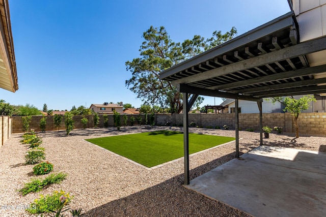 1521 W Jacinto Ave, Mesa, AZ 85202 - fenced backyard with a patio area