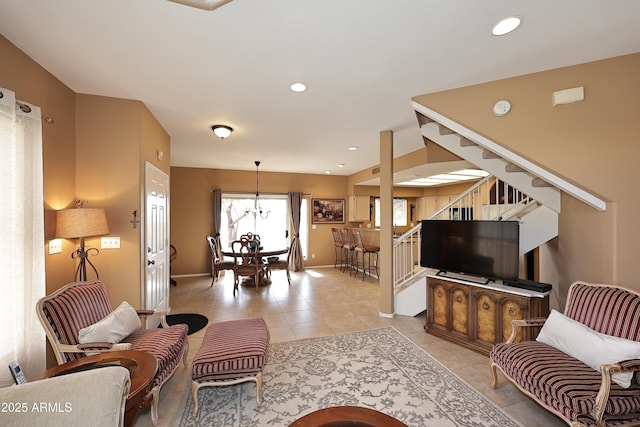 living room with recessed lighting, light tile patterned floors, baseboards, and stairs