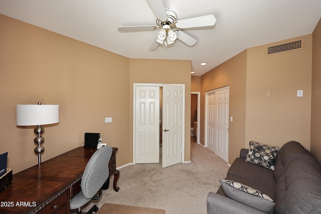 carpeted home office featuring visible vents, a ceiling fan, and recessed lighting