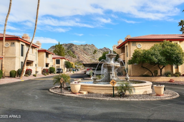 view of community featuring a mountain view