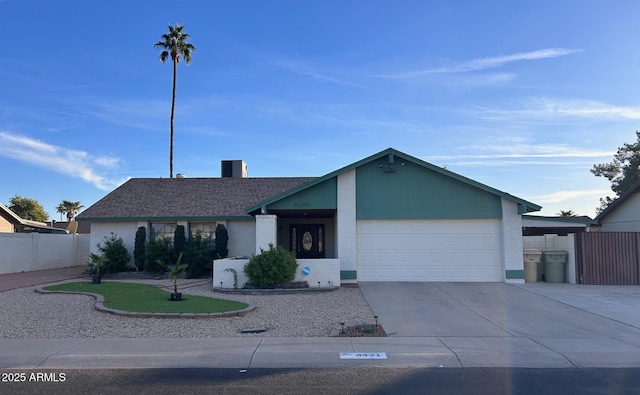 ranch-style home featuring a garage