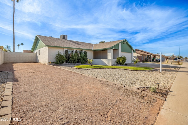 ranch-style house with a garage