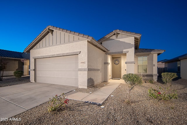 view of front of home with a garage