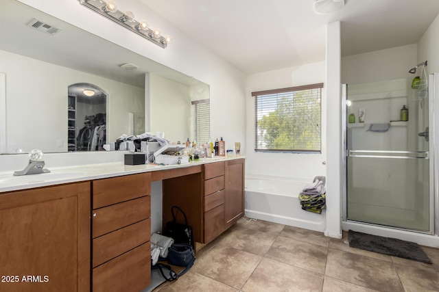 9236 N 184th Ln, Waddell, AZ 85355 - full bath with a shower stall, double vanity, a garden tub, and a spacious closet