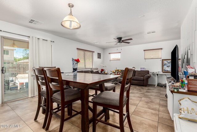9236 N 184th Ln, Waddell, AZ 85355 - dining space with light tile patterned flooring and ceiling fan