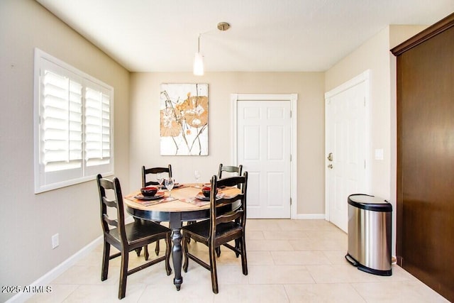 dining room with light tile patterned floors