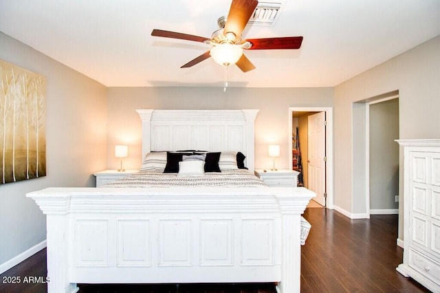 bedroom featuring ceiling fan and dark hardwood / wood-style floors