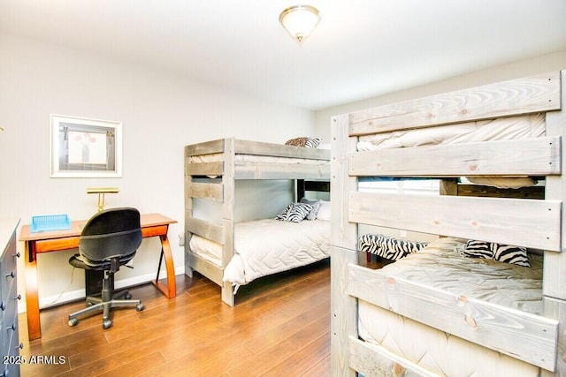 bedroom featuring hardwood / wood-style floors