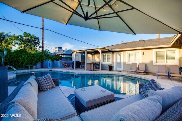 view of swimming pool featuring a patio area and outdoor lounge area