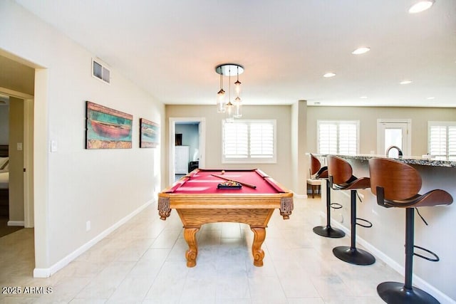 recreation room featuring billiards and a healthy amount of sunlight