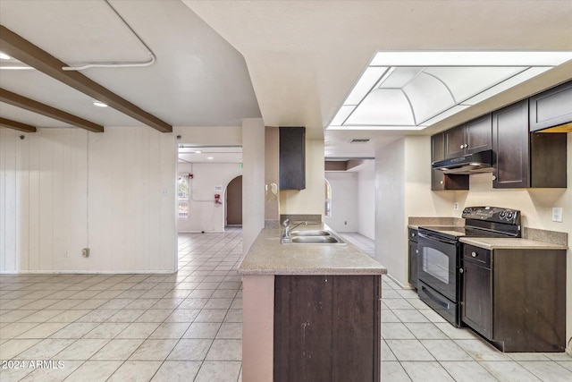 kitchen featuring black range with electric stovetop, sink, light tile patterned floors, beamed ceiling, and dark brown cabinets