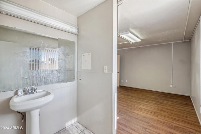 bathroom featuring hardwood / wood-style flooring