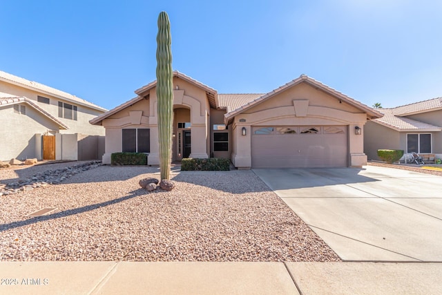 view of front of home with a garage