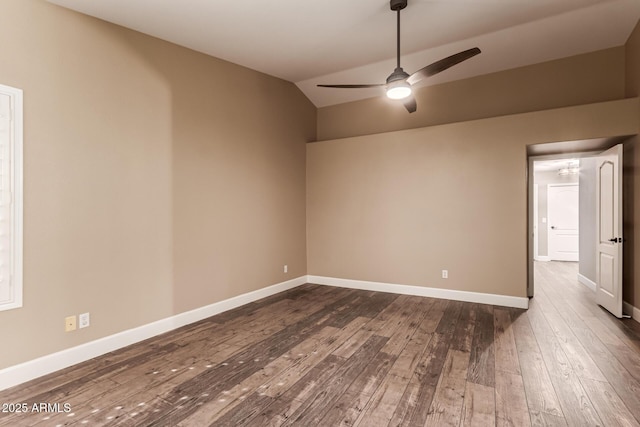 spare room featuring ceiling fan, lofted ceiling, and hardwood / wood-style floors