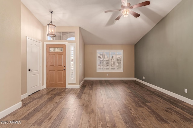 entrance foyer with lofted ceiling, dark hardwood / wood-style floors, and ceiling fan