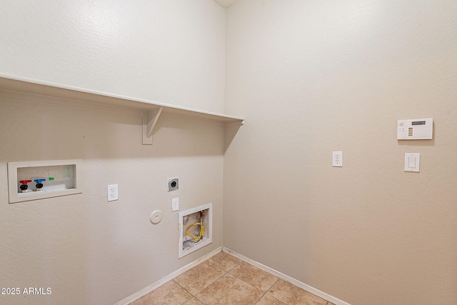 laundry room featuring baseboards, hookup for a washing machine, electric dryer hookup, laundry area, and light tile patterned floors