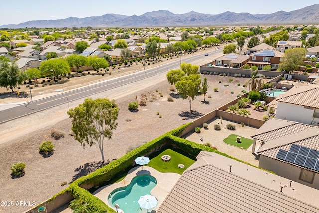 drone / aerial view featuring a mountain view and a residential view