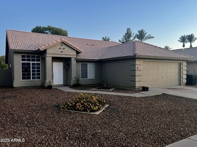 1381 W Gary Dr, Chandler, AZ 85224 - view of front of property with a tiled roof, a garage, stucco siding, and driveway