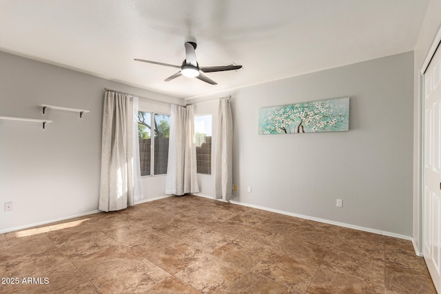 1381 W Gary Dr, Chandler, AZ 85224 - empty room featuring ceiling fan and stone finish floors
