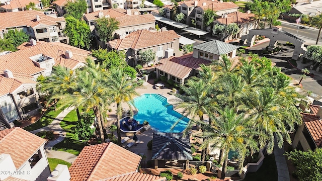 aerial perspective of suburban area with a pool