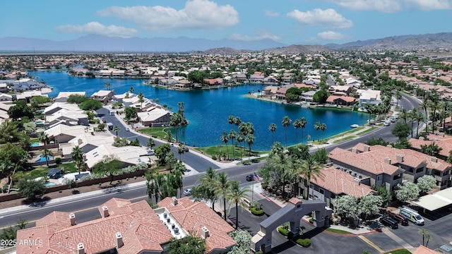 aerial perspective of suburban area with a water and mountain view