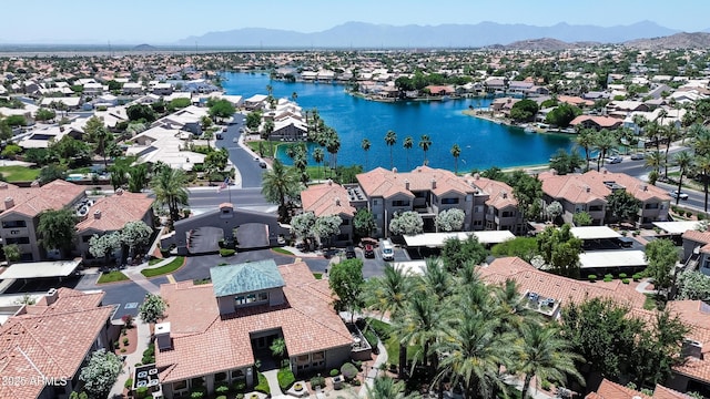 aerial view of residential area with a water and mountain view