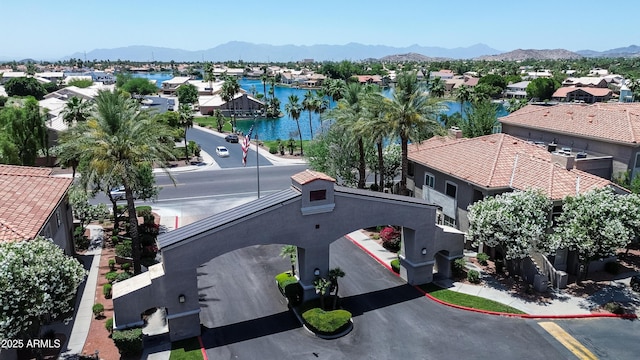 aerial view of residential area with a water and mountain view