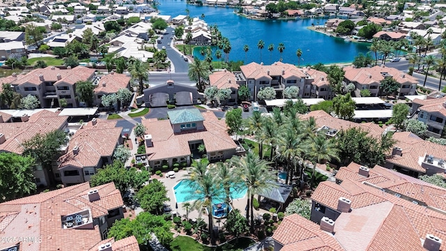 aerial view of residential area with a nearby body of water