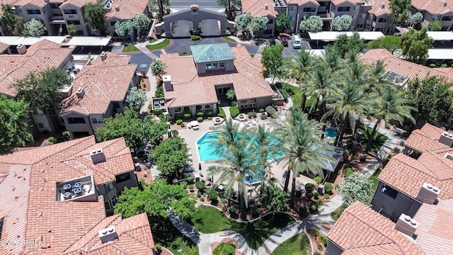 aerial perspective of suburban area featuring a pool area