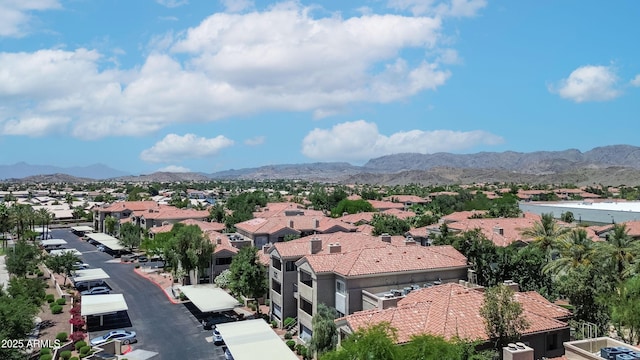 view of mountain background with nearby suburban area