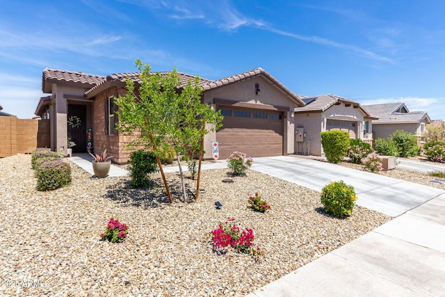 19414 W Highland Ave, Litchfield Park, AZ 85340 - ranch-style house with a garage, fence, stucco siding, driveway, and a tile roof