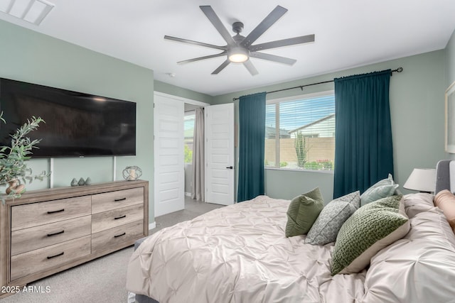 19414 W Highland Ave, Litchfield Park, AZ 85340 - bedroom with visible vents, ceiling fan, and light carpet