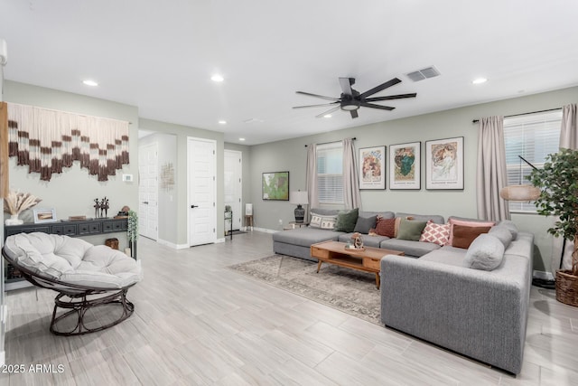19414 W Highland Ave, Litchfield Park, AZ 85340 - living area with visible vents, recessed lighting, a ceiling fan, and a healthy amount of sunlight