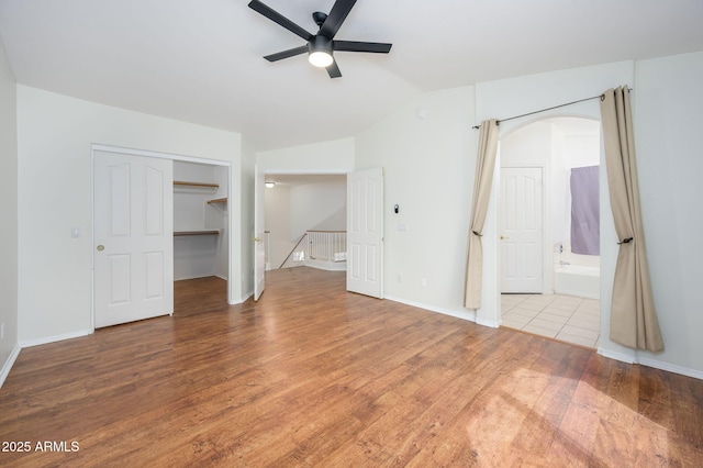 25825 N 65th Ave, Phoenix, AZ 85083 - interior space with vaulted ceiling, wood finished floors, baseboards, and ceiling fan