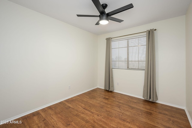 25825 N 65th Ave, Phoenix, AZ 85083 - spare room with wood finished floors, baseboards, and ceiling fan