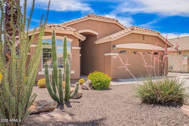 3913 E Derringer Way, Gilbert, AZ 85297 - mediterranean / spanish house with a garage, stucco siding, and a tile roof
