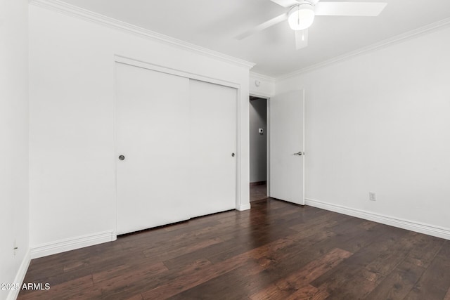 3913 E Derringer Way, Gilbert, AZ 85297 - unfurnished bedroom with dark wood-style floors, crown molding, a closet, and baseboards