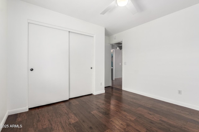 3913 E Derringer Way, Gilbert, AZ 85297 - unfurnished bedroom with wood finished floors, a closet, baseboards, and ceiling fan