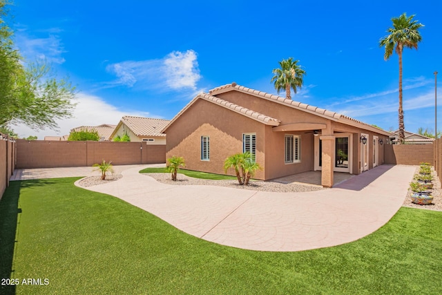 3913 E Derringer Way, Gilbert, AZ 85297 - rear view of house featuring stucco siding, a patio area, a ceiling fan, and a tiled roof