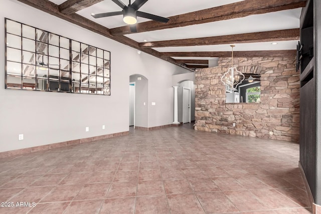 3913 E Derringer Way, Gilbert, AZ 85297 - tiled spare room with arched walkways, a chandelier, ceiling fan, and beamed ceiling