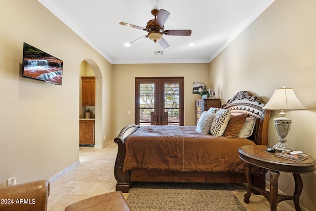 bedroom featuring ceiling fan, french doors, and crown molding