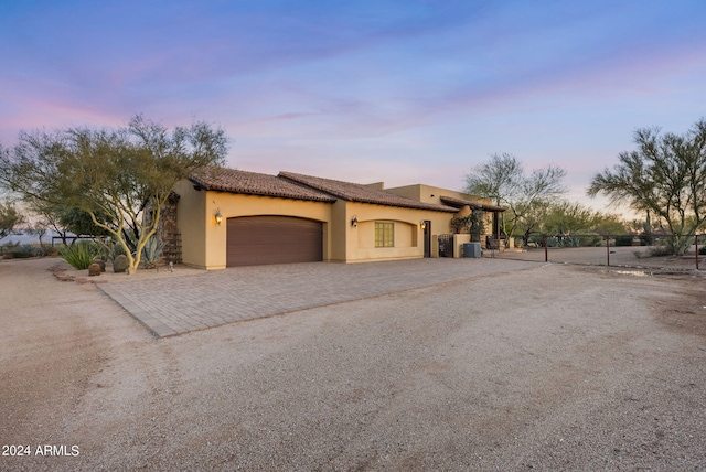 view of front of house with a garage