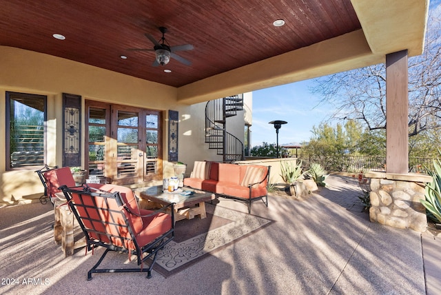 view of patio with ceiling fan and outdoor lounge area