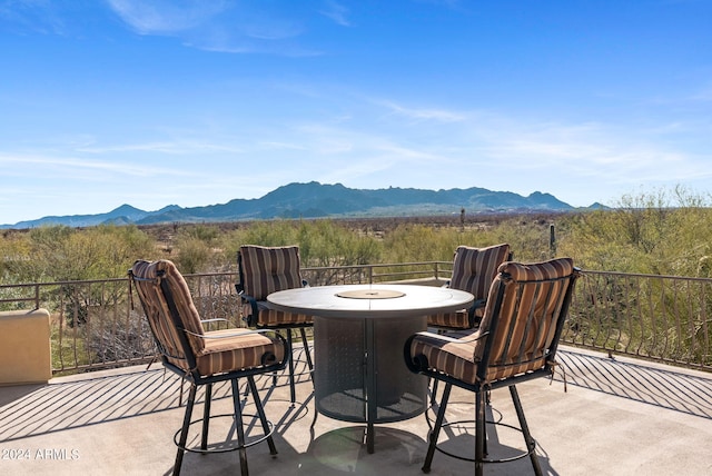 view of patio / terrace with a mountain view