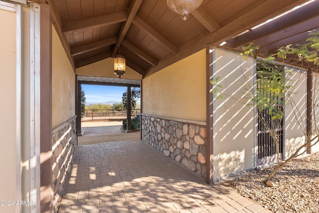 view of side of property featuring a patio area